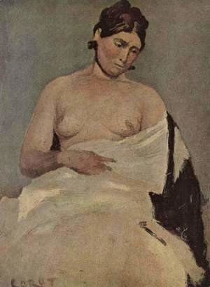 Sitting woman with bare breasts