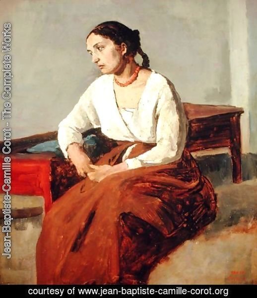 Seated Woman in Brown Skirt